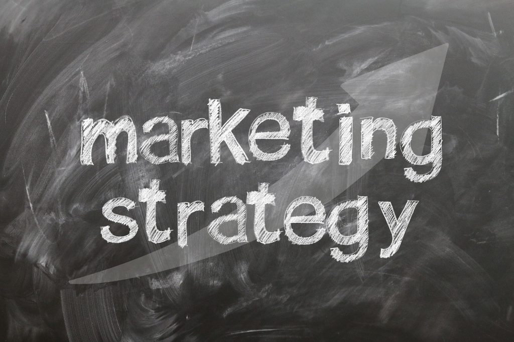 korea b2b marketing agency vs in-house - marketing team reviewing korea pipeline results in foreign company office